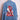 Blue denim jacket with embroidered woman in traditional red headdress and floral design on back