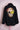 Black corduroy jacket with embroidered gold skull, yellow rose patch, and red cursive text on back