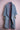 Light blue denim kimono with gold sequin detail on sleeves displayed on pink wire mannequin