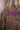 Leopard print jacket with purple jeweled embroidery and gold fringe detail on back